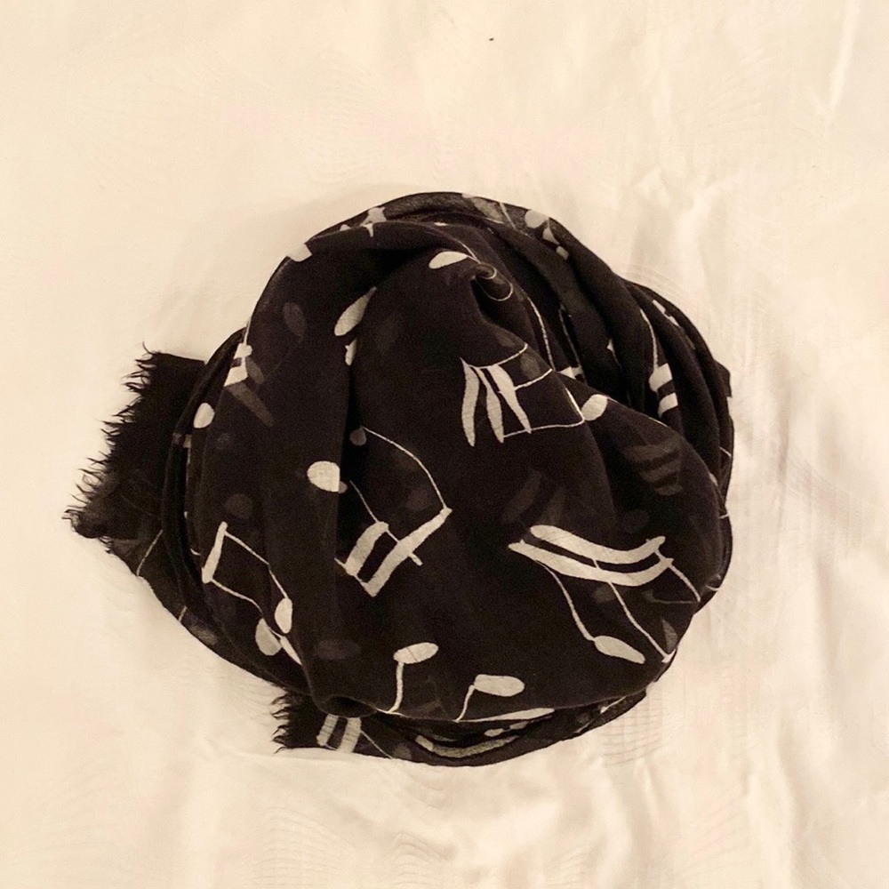 Black background scarf with white music notes